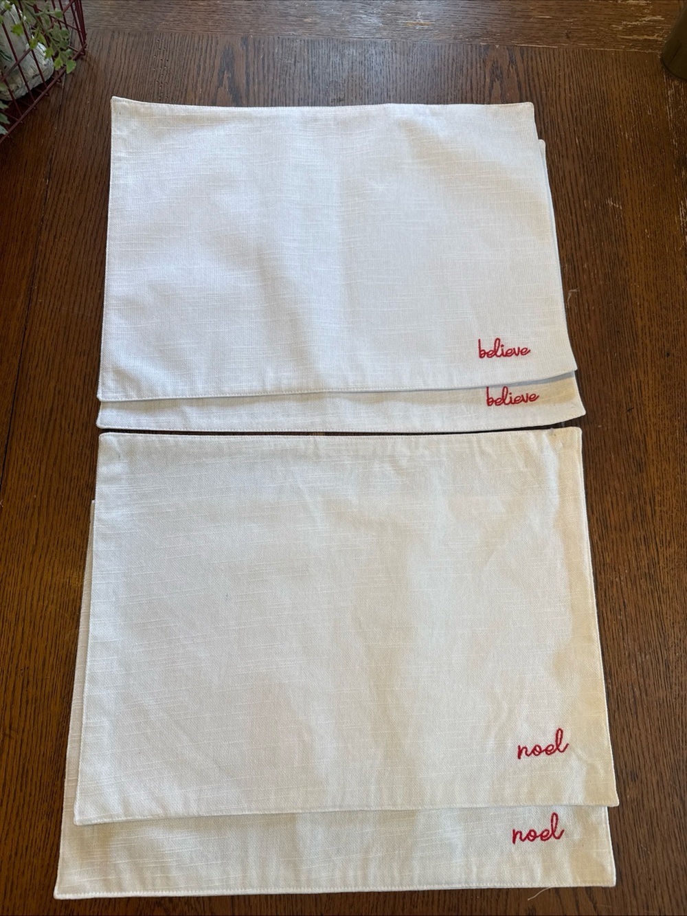 Embroidered Holiday Placemats Set - White with Red Script